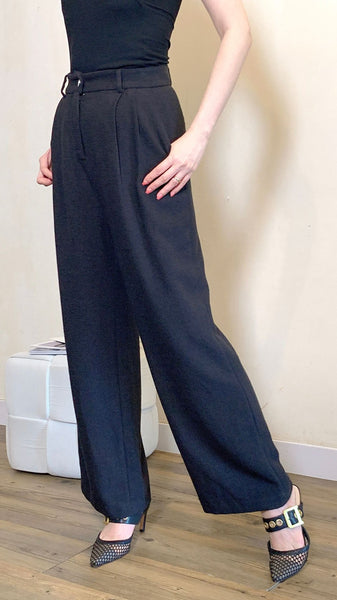 Black silhouette work pants with rhinestone button