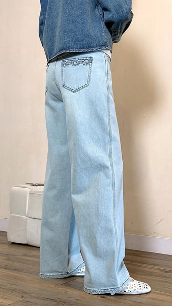 Pale blue soft wide leg jeans with embroidered pockets