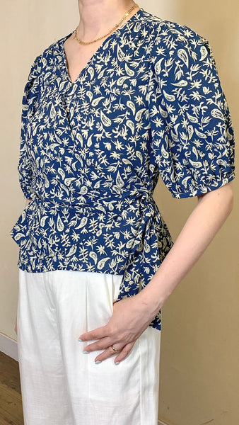 Butterfly motif blue wrapped blouse