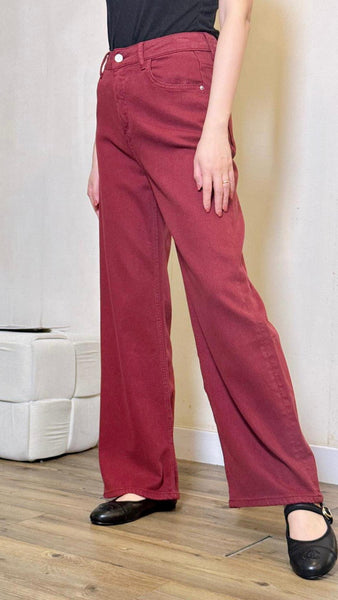 Burgundy wide-leg jeans with gold button