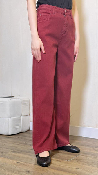 Burgundy wide-leg jeans with gold button