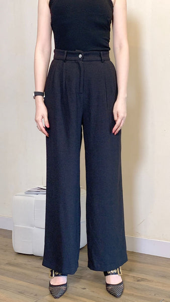 Black silhouette work pants with rhinestone button