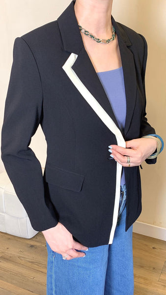 Stylish black blazer with white stripy panel