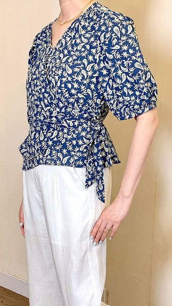 Butterfly motif blue wrapped blouse
