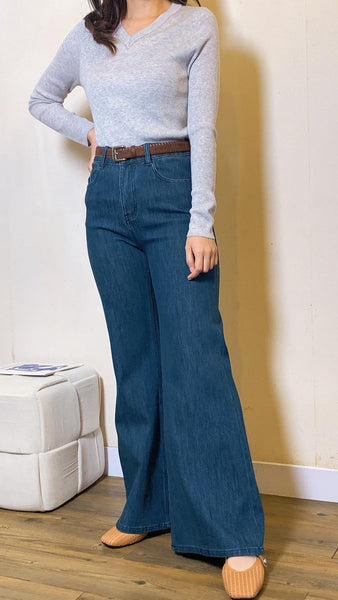 Blue mini flare jeans with brown belt