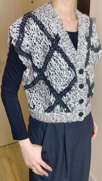 Grey knitted waistcoat with sequined cross pattern