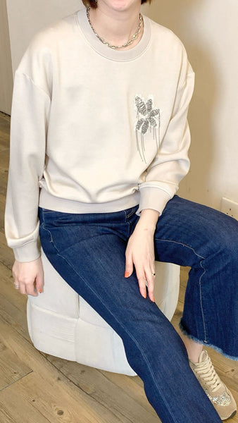 Ivory ultra soft sweatshirt with 3d floral motif