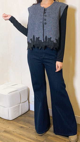 Dark denim wool vest with floral hem