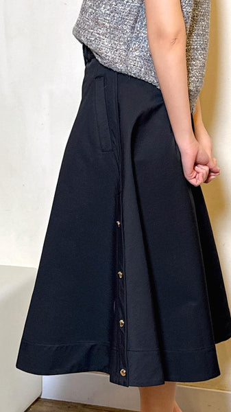 Black polyester A-lined belted maxi skirt